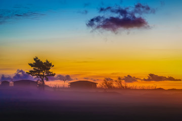 in the evening the sun and mist to travel