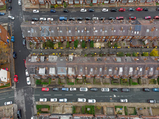 Aerial photo of a typical town in the UK showing rows of houses, paths & roads, taken over Headingley in Leeds, which is in West Yorkshire in the UK.