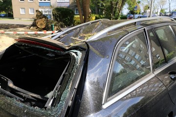 New car with storm damage