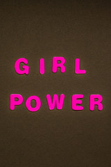 GIRL POWER writing on black paper background