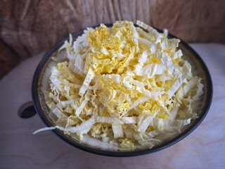 Chinese cabbage on a round ceramic dish
