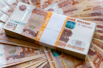 Russian rubles isolated, packed stack of banknotes 5000 rubles