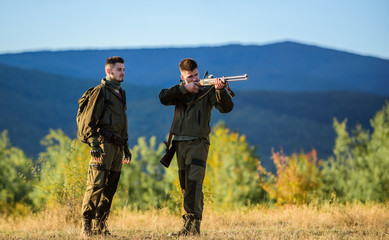 How turn hunting into hobby. Guys hunting nature environment. Masculine hobby activity. Hunting...