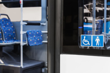 Obraz premium modern city bus with seats for disabled and elderly people