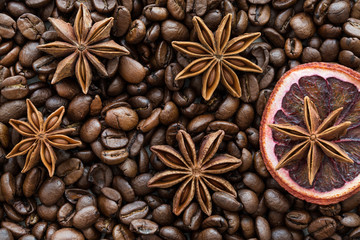 Dried sicilian orange slice and coffee beans, macro, tio view. Christmas concept. WIntertime. 