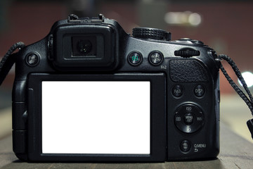 Isolated DSLR on blurry background with lights