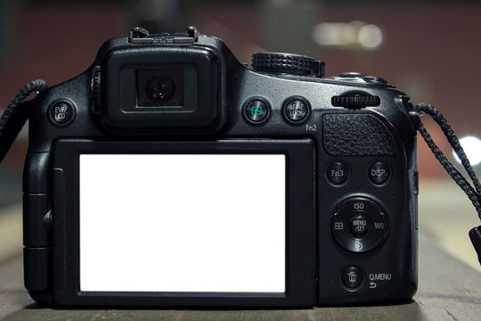 Isolated DSLR on blurry background with lights