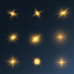 Set of gold bright beautiful stars. Light effect Bright Star. Beautiful light for illustration. Christmas star. White sparks sparkle with a special light. Vector sparkles on transparent background