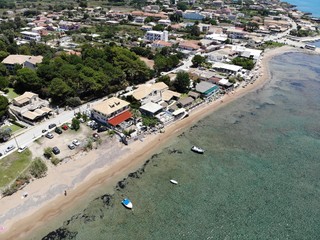 Fototapeta na wymiar Greece aerial photo taken at the beautiful coastal town of St George South in Greece