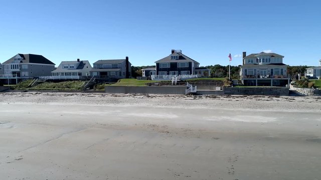 Exeter, New Hampshire - 20181016 - Aerial Drone - Pan Along Beach Looking At Beachfront Mansions 4K