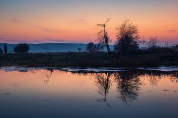 Fototapeta na wymiar Twilight over the Habdzin lake near Konstancin-Jeziorna, Masovia, Poland
