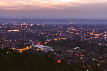 Fototapeta na wymiar View on a city in the evening