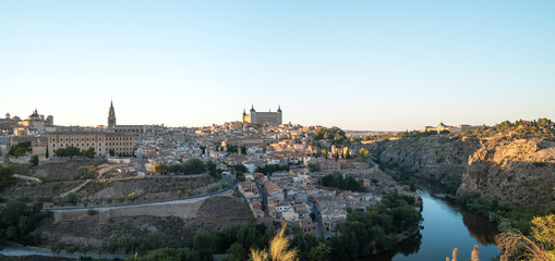 Fototapeta na wymiar Panoramic landscape of Toledo old town and river Tajo at early morning