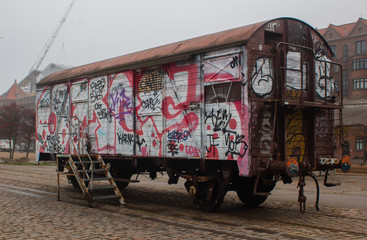 old tram with graffiti