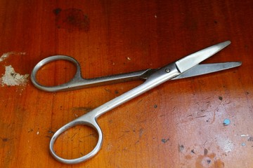 Obraz premium The scissors on the table