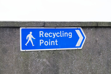 Fototapeta premium Recycling point directional arrow sign