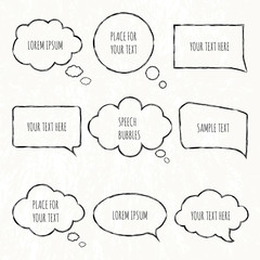 Hand drawn collection of dialog windows. Vector set of speech bubbles and thought communication bubbles.