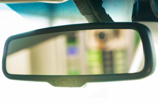 Blurred Rear View Mirror Of Modern Car Close Up