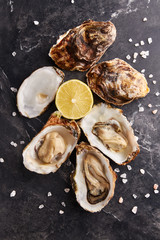 Oyster served with lemon and salt