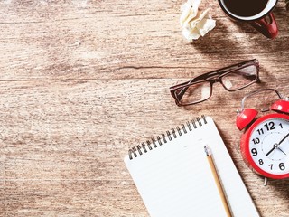 Flat lay Office desk table Top view with paper glasses cup coffee copy space