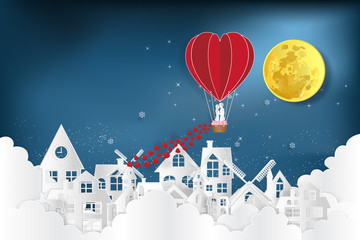 Fototapeta na wymiar Paper art , cut and digital craft style of the lover in hot air balloons on night village in the cloud and dark blue background as love , wedding and valentine concept. vector illustration
