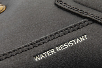 leather boots stitched with thread close up