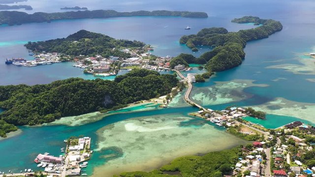 Aerial panoramic view of city of Koror, azure crystal clear water of western Pacific Ocean - landscape panorama of Micronesia from above, Koror Island, Palau