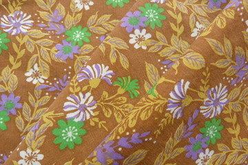 cotton fabric closeup brown background multicolored flowers natural colors canvas for drawing