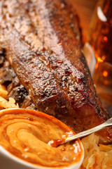 Rosted ribs with spices on wooden board