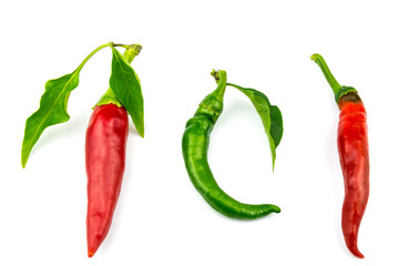 Two red hot chili peppers and one bent isolated on a white background.
