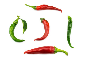 Five hot peppers isolated on a white background.