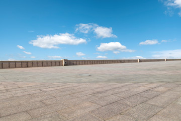 Empty square tiles and beautiful sky scenery