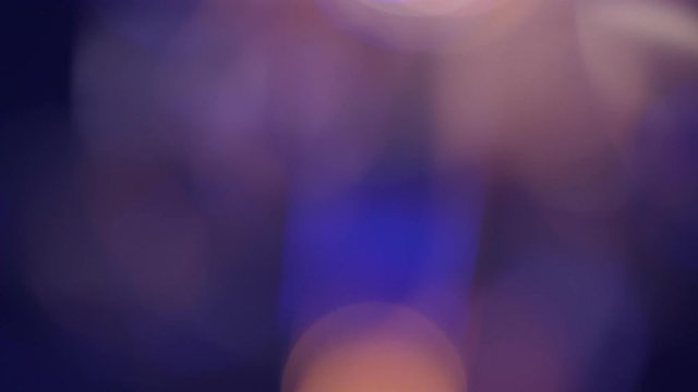 Moving blue and purple moving bokeh background