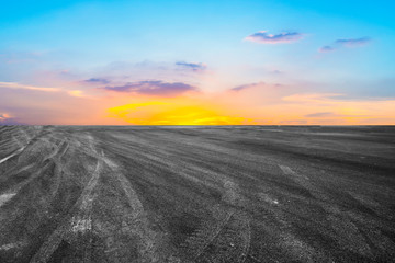 Empty highway asphalt pavement and sky cloud landscape..