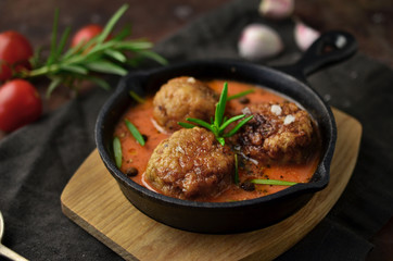 meatballs with sauce on skillet