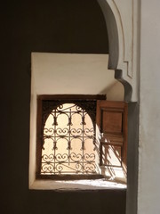 sunlight through iron window grille