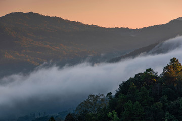Mist covered mountains early morning Mae Hong Son Thailand.