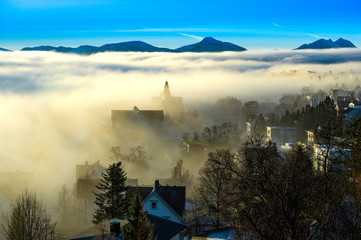 .Fog over the city of Tromso