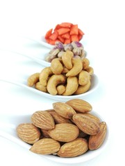 assorted, cashew nuts,  pistachio, almond and fish cracker