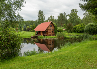 house on the pond with reflection