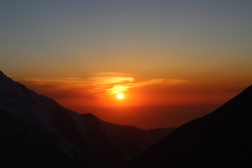 Fiery red sunset in the mountains.