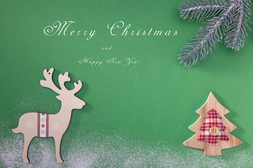 Greeting card with a Merry Christmas tree and snow, a symbol of the holiday, family togetherness. Happy New Year.