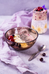 Healthy smoothy and pudding chia boul for breakfast with banana, cherry, and black currant