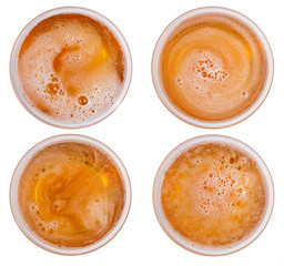 Beer in glass. Beer foam isolated on white background. View from above.	