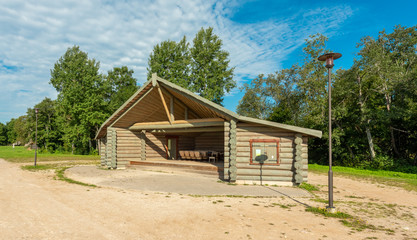Fototapeta na wymiar log house with roof