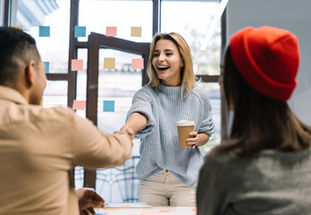 Business woman handshake with business partner Successful deal Agreement Trust. Motivated creative...