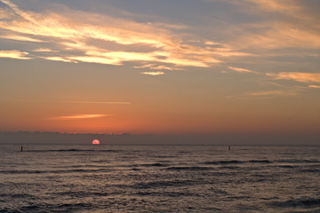 sunrise over the sea,horizon,sun,nature,sky,morning,view,cloud,waves,