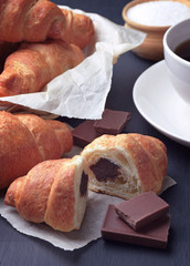 croissant pastry with chocolate topping . Fresh bakery . Close-up.