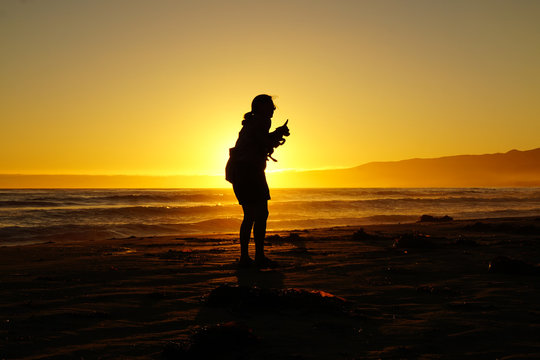 Kathy and Juno at sunset, CA