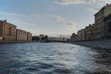 River tour of the rivers and canals of St. Petersburg, Russia in the summer evening.